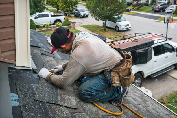Professional Roofing technician working in Percival, IA